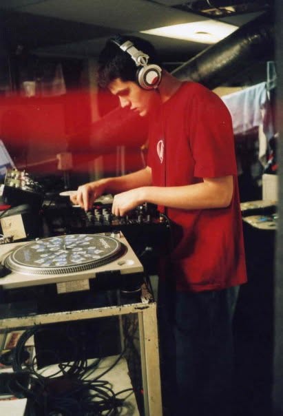 Young Elvis at his turntables in his parents’ basement